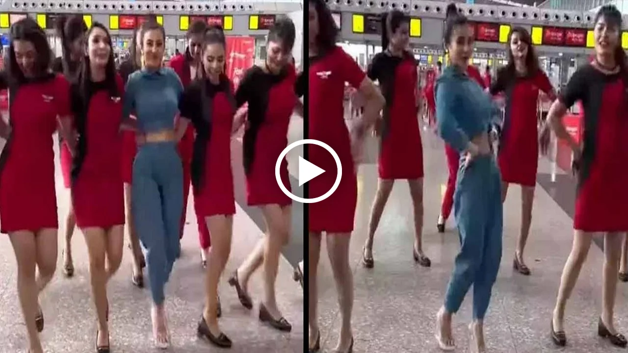 Actress dancing with staff at Kolkata Airport