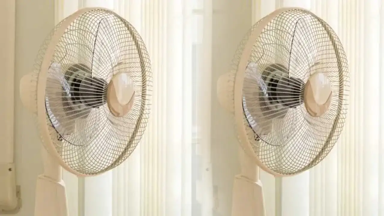 viral-video-man-spinning-of-a-table-fan-for-keep-cool-during-summer