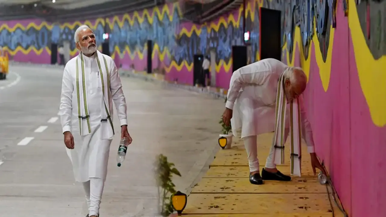 Narendra Modi picks up litter newly-inaugurated tunnel in Delhi