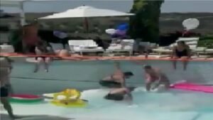 Shocking video sink hole forms bottom pool pulls