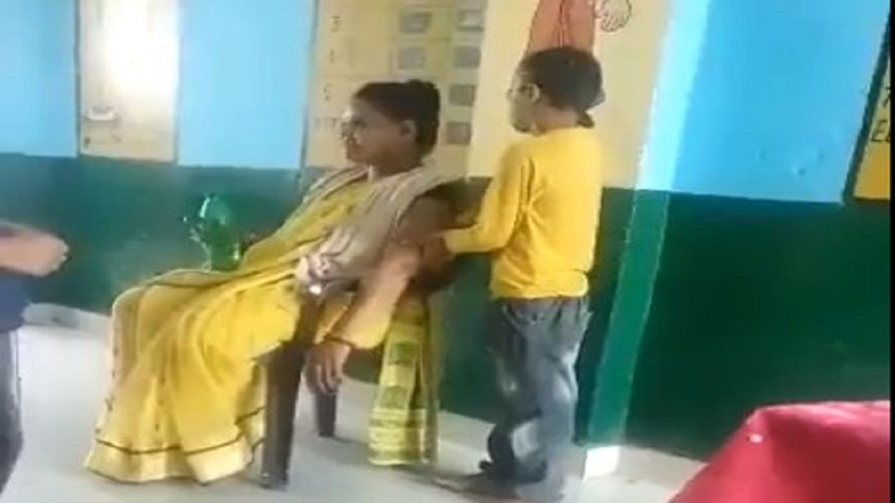 Teacher caught getting bicep massage by student viral video