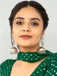 Anchor Sreemukhi green dress photos viral