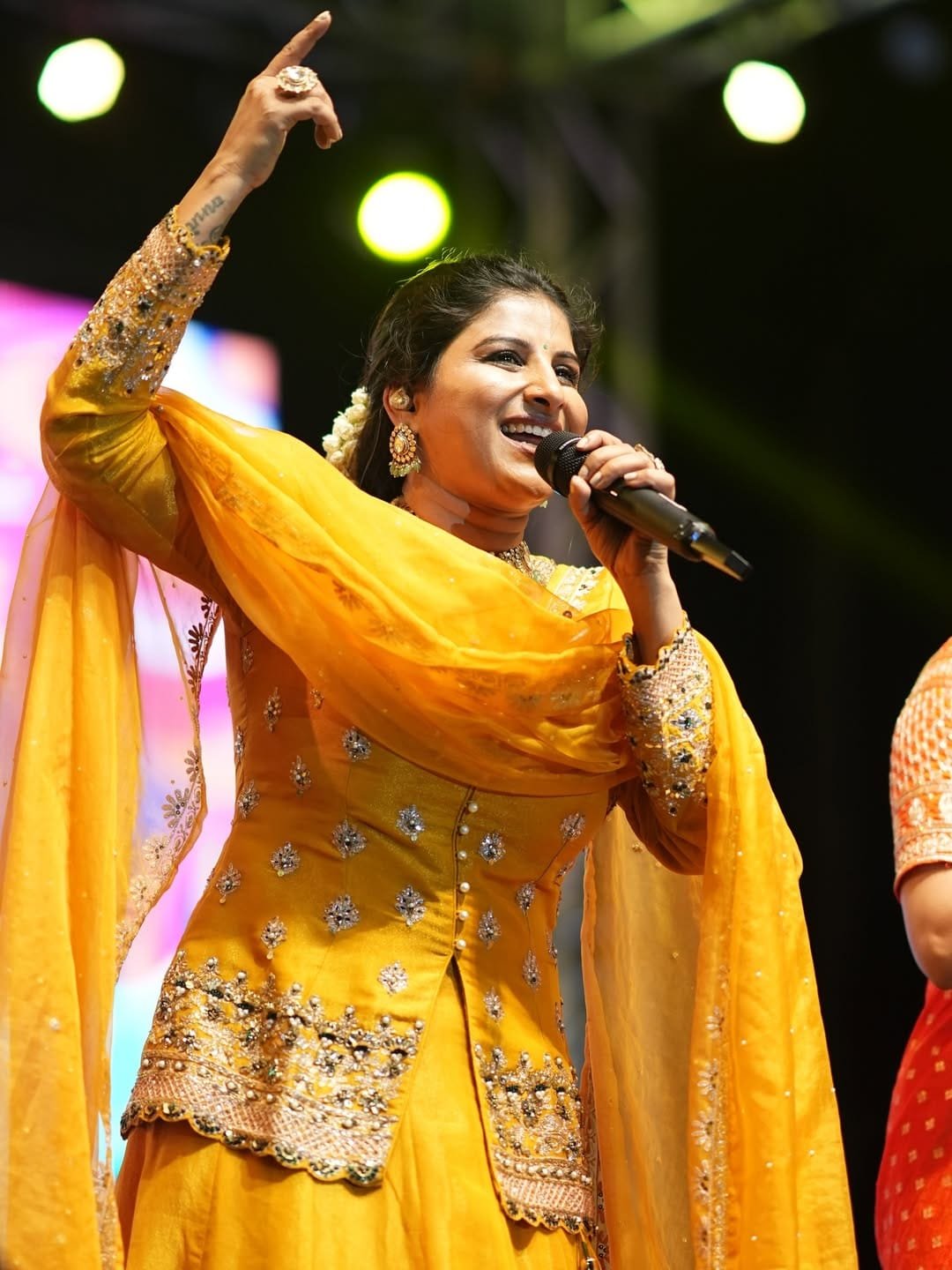 singer mangli yellow dress photos viral